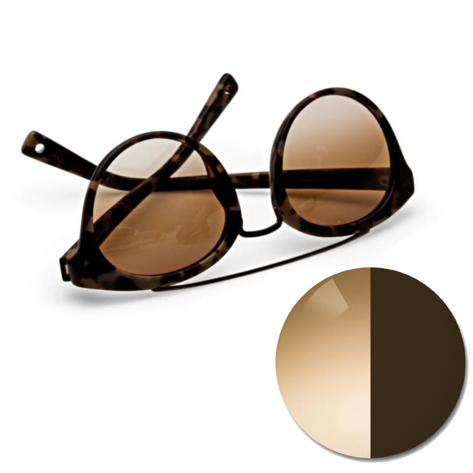 Óculos com lentes ZEISS AdaptiveSun em brown degradê e um círculo dividido num tom claro e num tom escuro